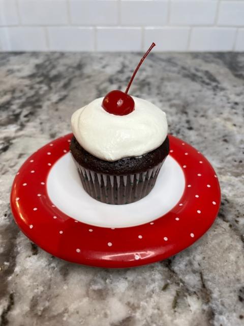 chocolate cupcake on red plate