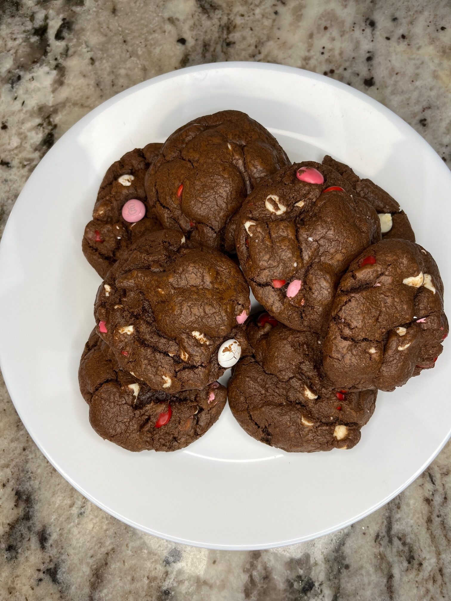 Chocolate cookies on white plate